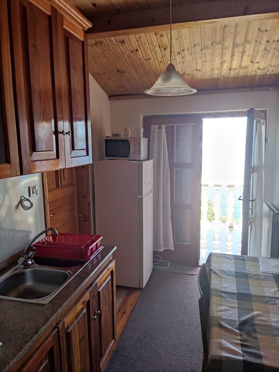 Apartment (A1) | Private kitchen | Fridge, microwave, oven, stovetop