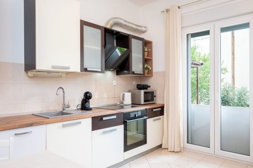Apartment (A1) | Private kitchen | Espresso maker, fridge, microwave, oven