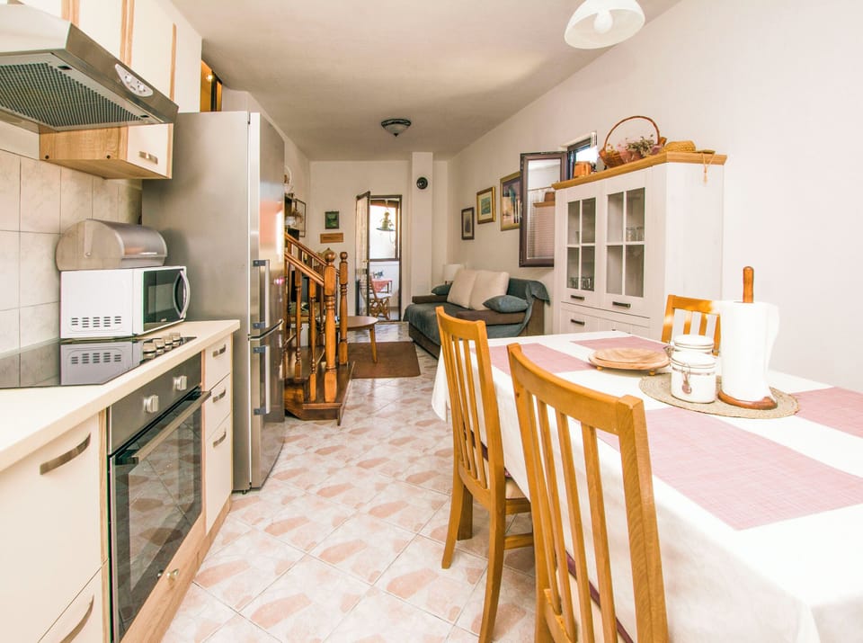 Apartment (A1) | Private kitchen | Fridge, microwave, oven, stovetop