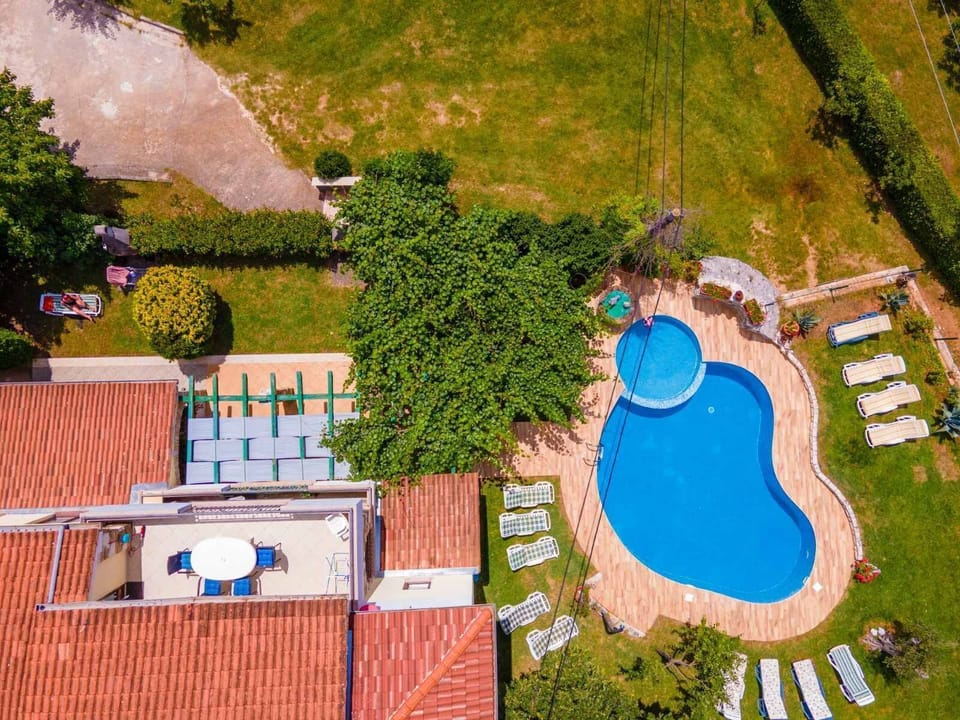 Outdoor pool, an infinity pool, open open 24 hours, pool umbrellas