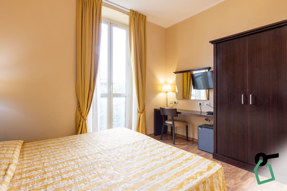 Standard Double or Twin Room | Minibar, in-room safe, free WiFi, bed sheets