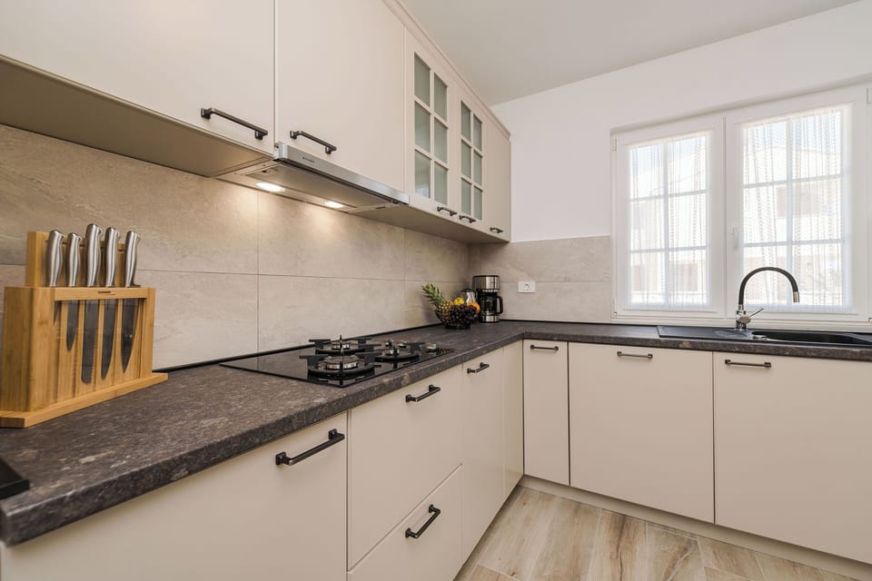 Villa | Private kitchen | Fridge, microwave, oven, stovetop
