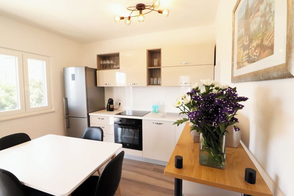 Villa | Private kitchen | Fridge, microwave, oven, stovetop