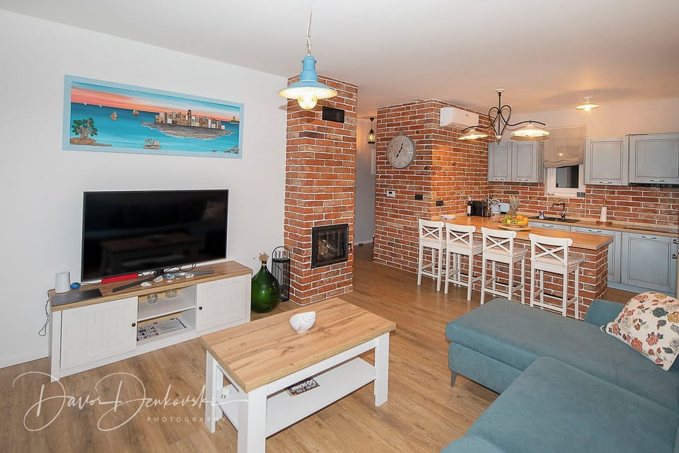 Villa | Living room | Fireplace