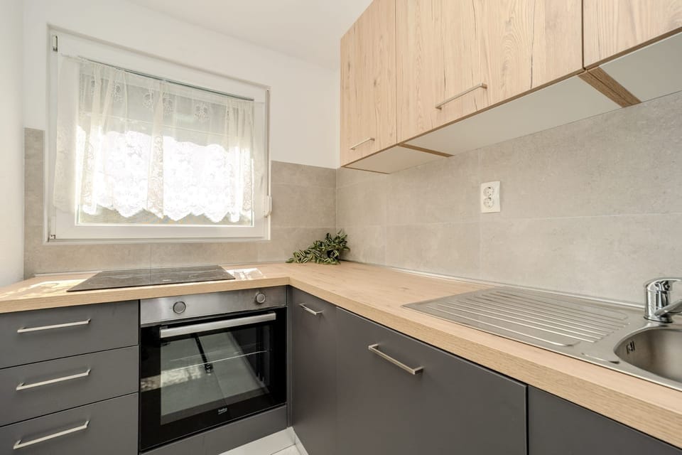 Villa | Private kitchen | Fridge, microwave, oven, stovetop