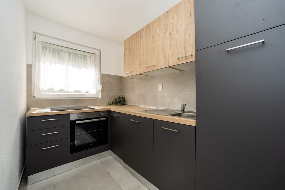 Villa | Private kitchen | Fridge, microwave, oven, stovetop