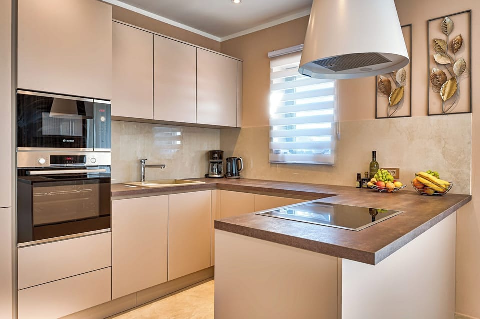 Villa | Private kitchen | Espresso maker, fridge, microwave, oven