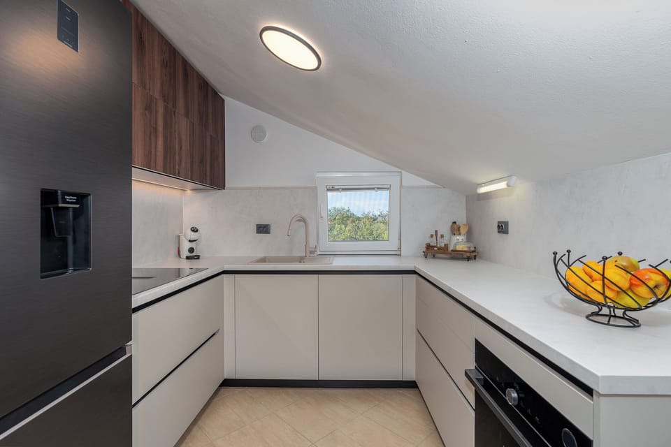 Villa | Private kitchen | Fridge, microwave, oven, stovetop