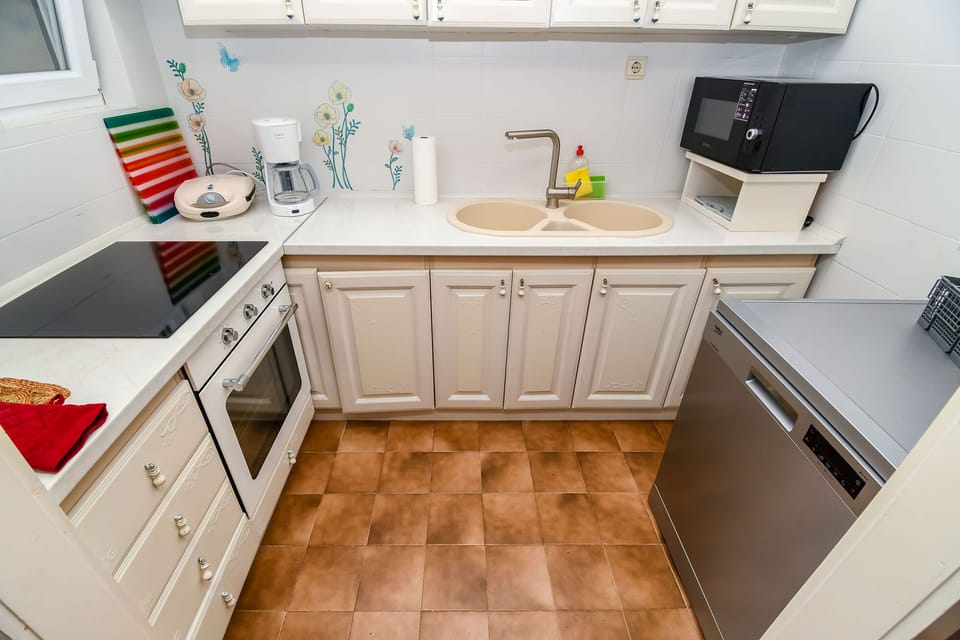 Villa | Private kitchen | Fridge, microwave, oven, stovetop