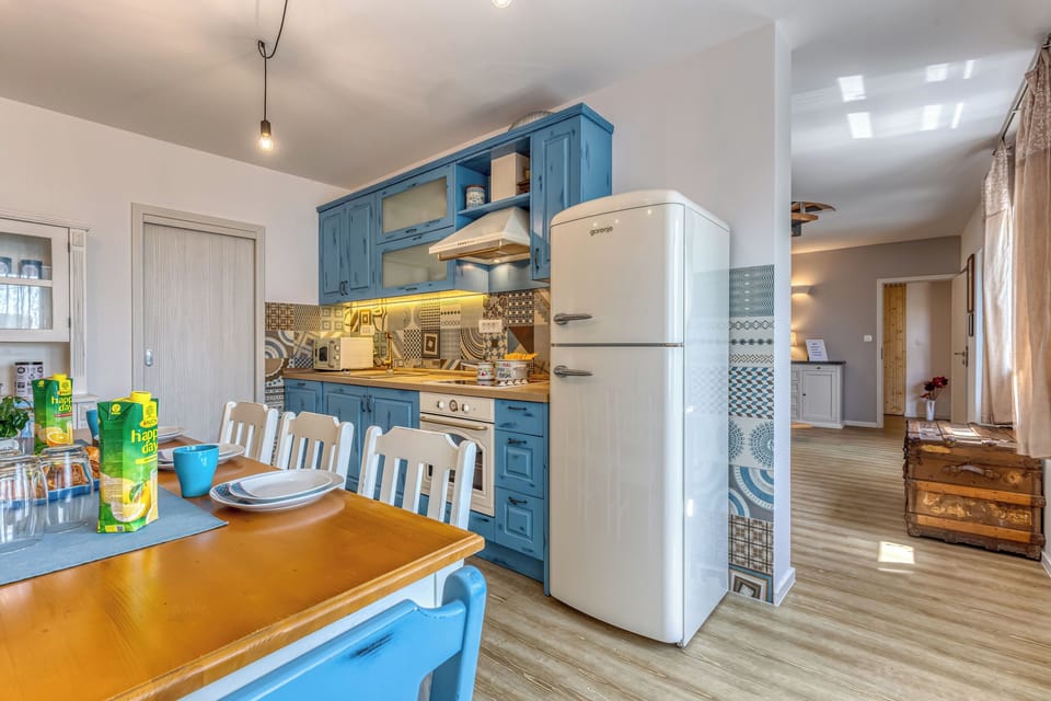 Villa | Private kitchen | Fridge, microwave, oven, stovetop