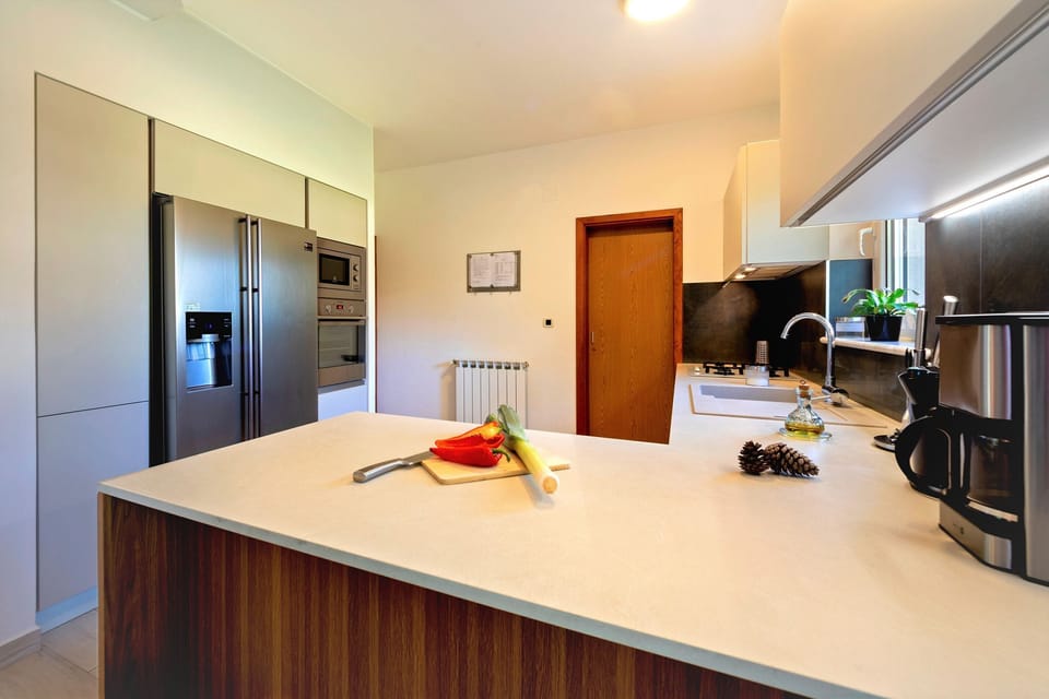 Villa | Private kitchen | Fridge, microwave, oven, stovetop