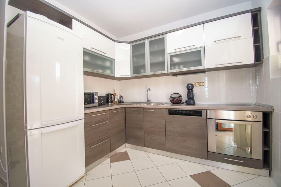 Villa | Private kitchen | Fridge, microwave, oven, stovetop