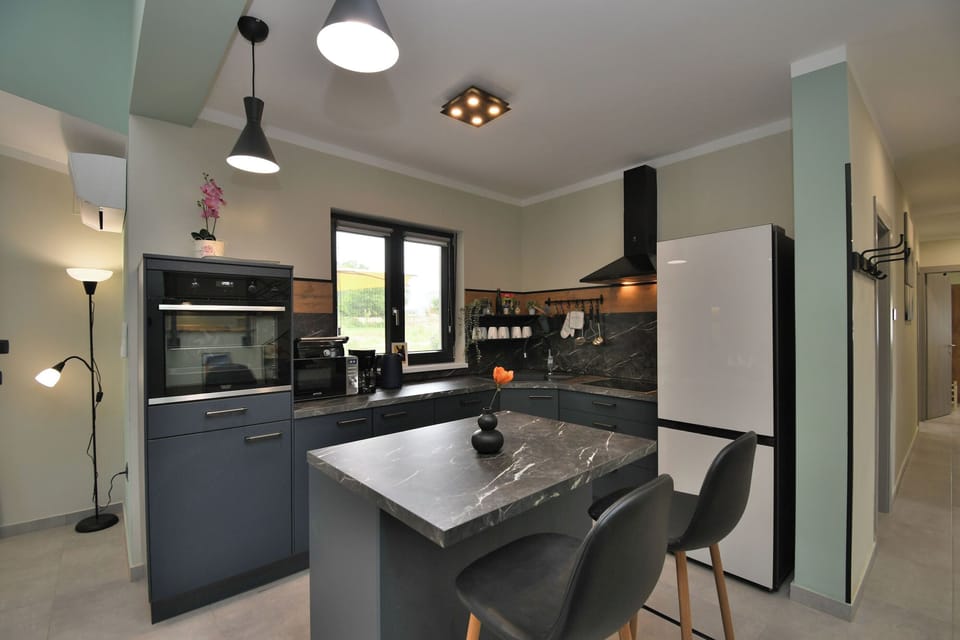 Villa | Private kitchen | Fridge, microwave, oven, stovetop