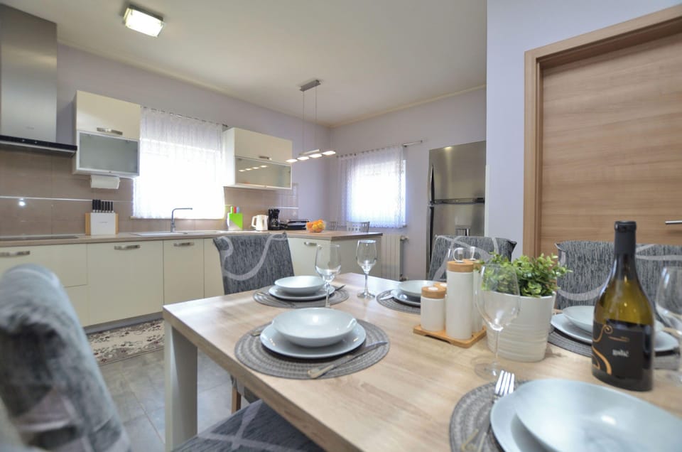 Villa | Private kitchen | Fridge, microwave, oven, stovetop