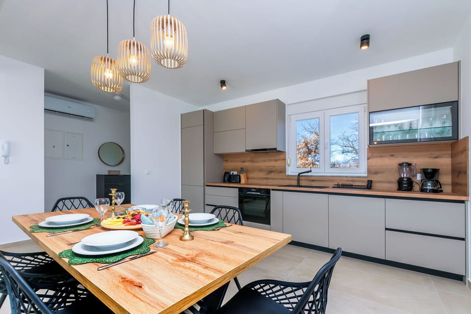 Villa | Private kitchen | Fridge, oven, stovetop, dishwasher