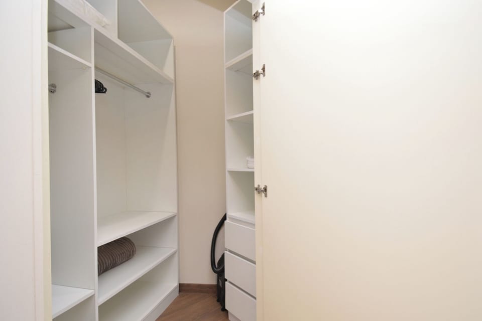 Condo, City View | Blackout drapes, iron/ironing board, free WiFi