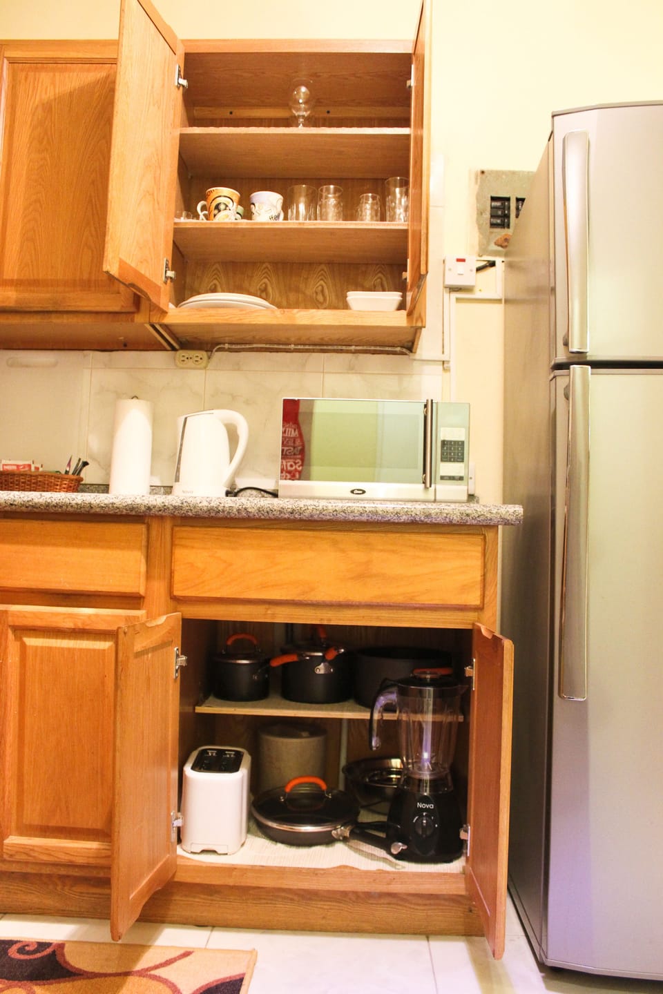Comfort Studio, 1 Bedroom | Private kitchen | Full-size fridge, microwave, stovetop, coffee/tea maker