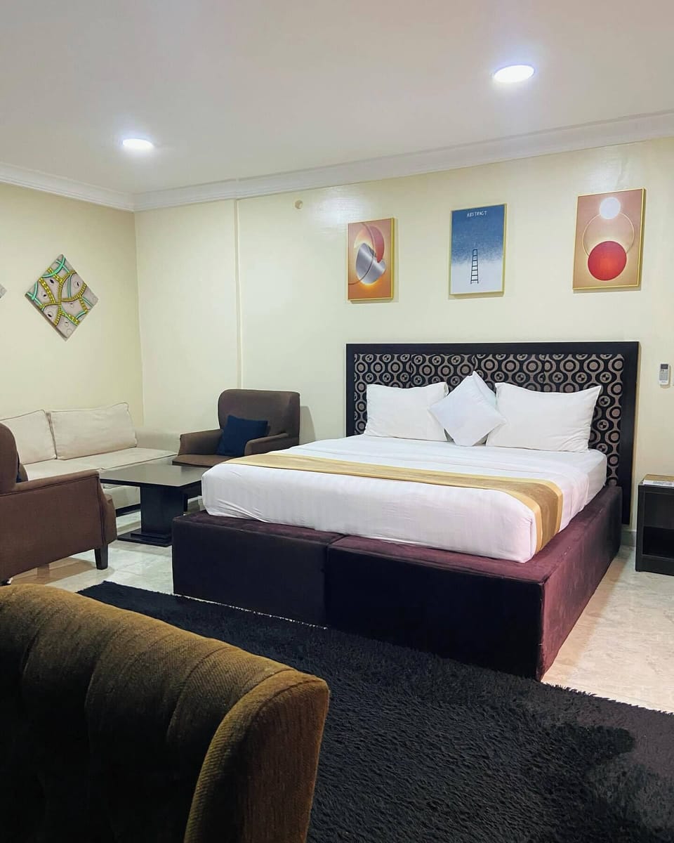Family Room, Balcony, City View | Desk, laptop workspace, blackout drapes, soundproofing
