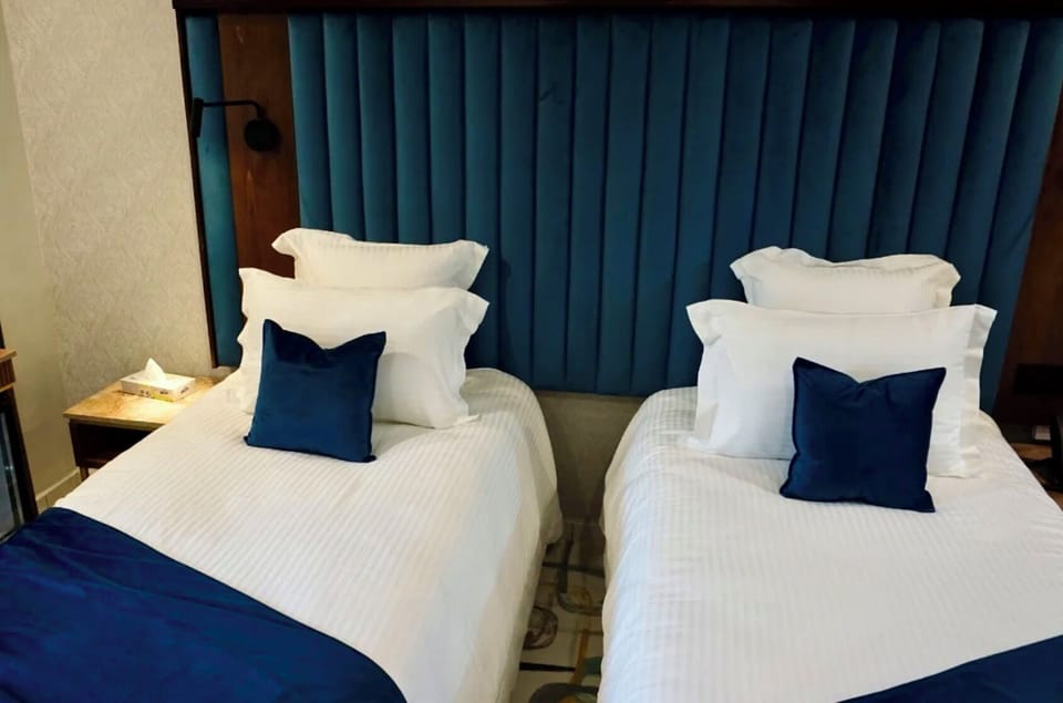 Standard Double or Twin Room | Minibar, in-room safe, desk, laptop workspace