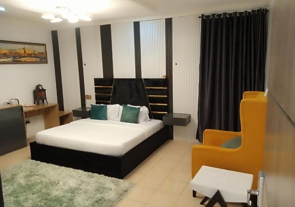 Economy Room, Balcony, City View | Desk, laptop workspace, blackout drapes, soundproofing