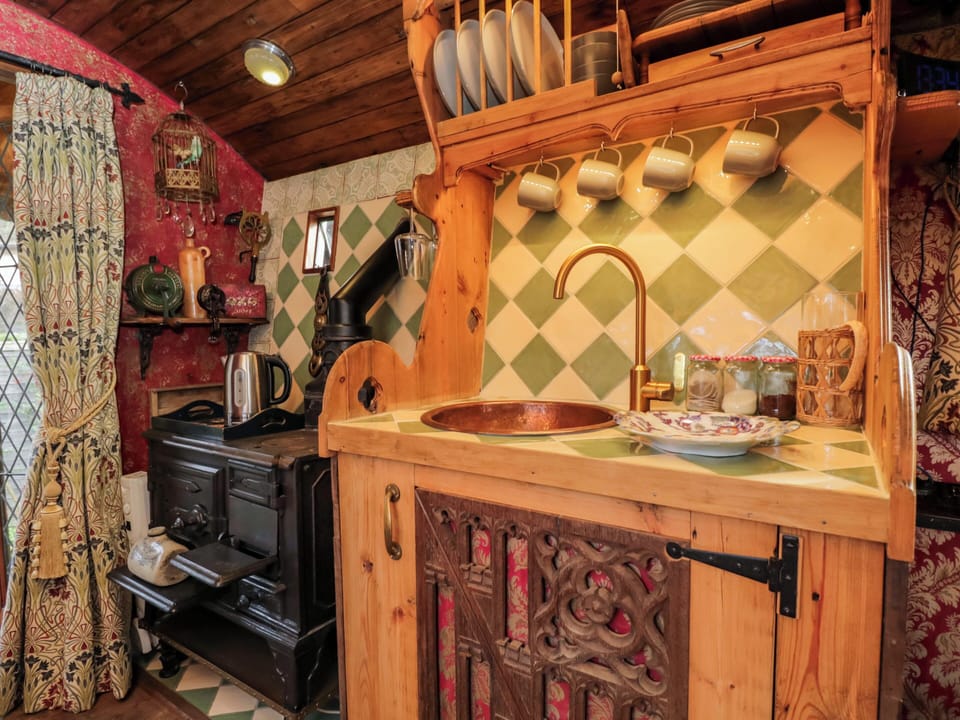 Fridge, microwave, toaster, cookware/dishes/utensils