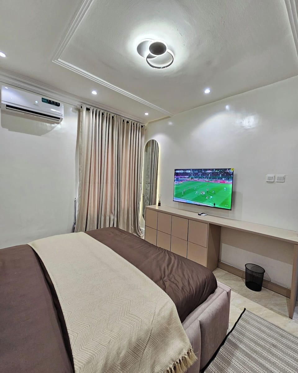 Economy Apartment, Balcony, City View | In-room safe, desk, laptop workspace, blackout drapes