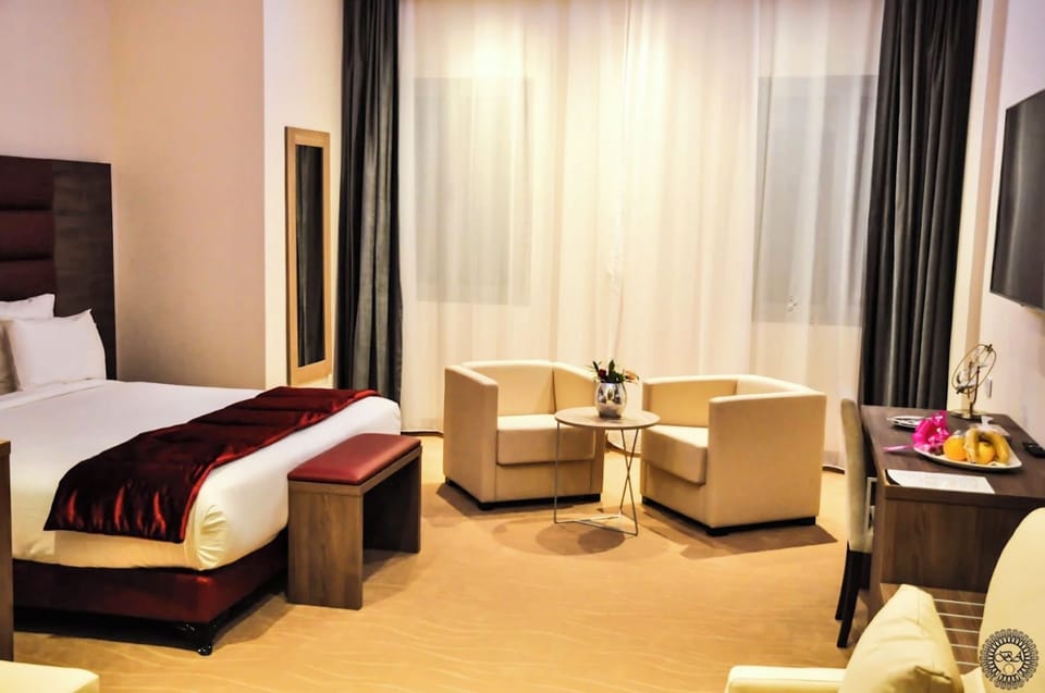 Standard Double or Twin Room | In-room safe, desk, laptop workspace, blackout drapes