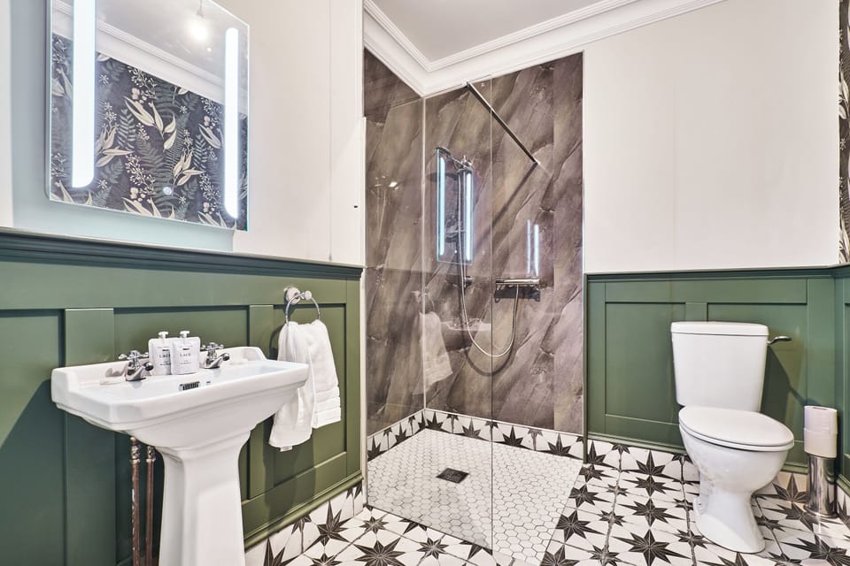 Deluxe Double Room | Bathroom | Bathrobes