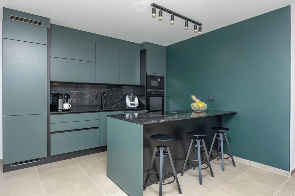Villa | Private kitchen | Fridge, microwave, oven, stovetop