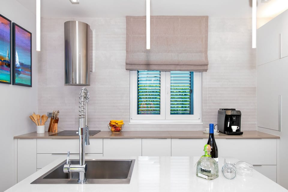 Villa | Private kitchen | Fridge, microwave, oven, stovetop