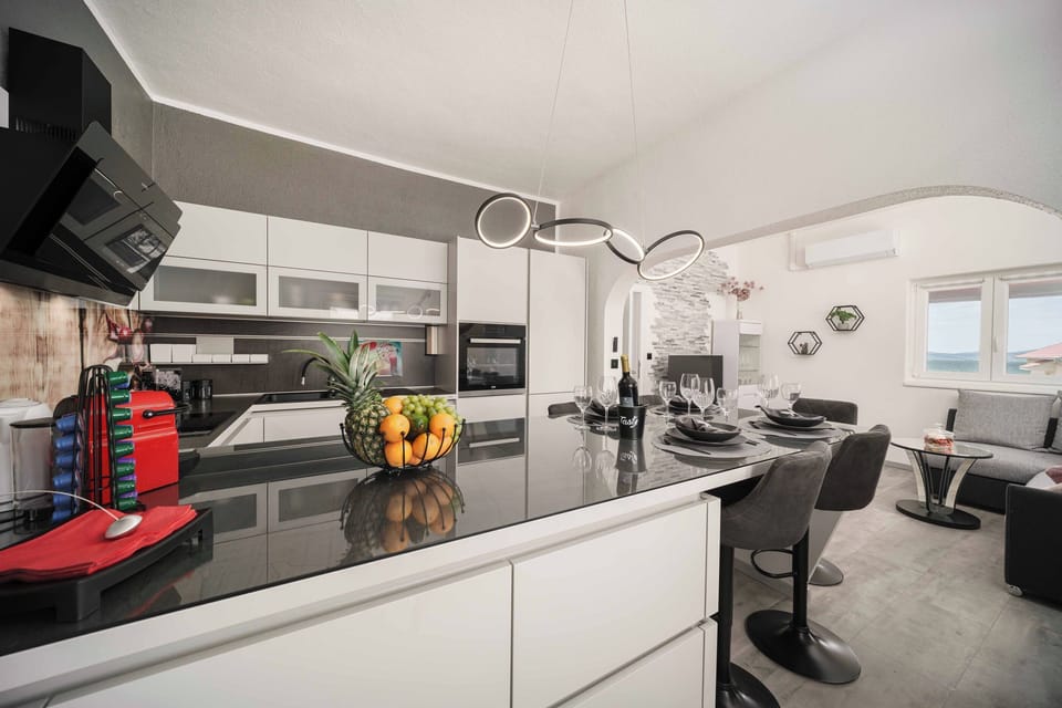 Villa | Private kitchen | Fridge, oven, stovetop, dishwasher