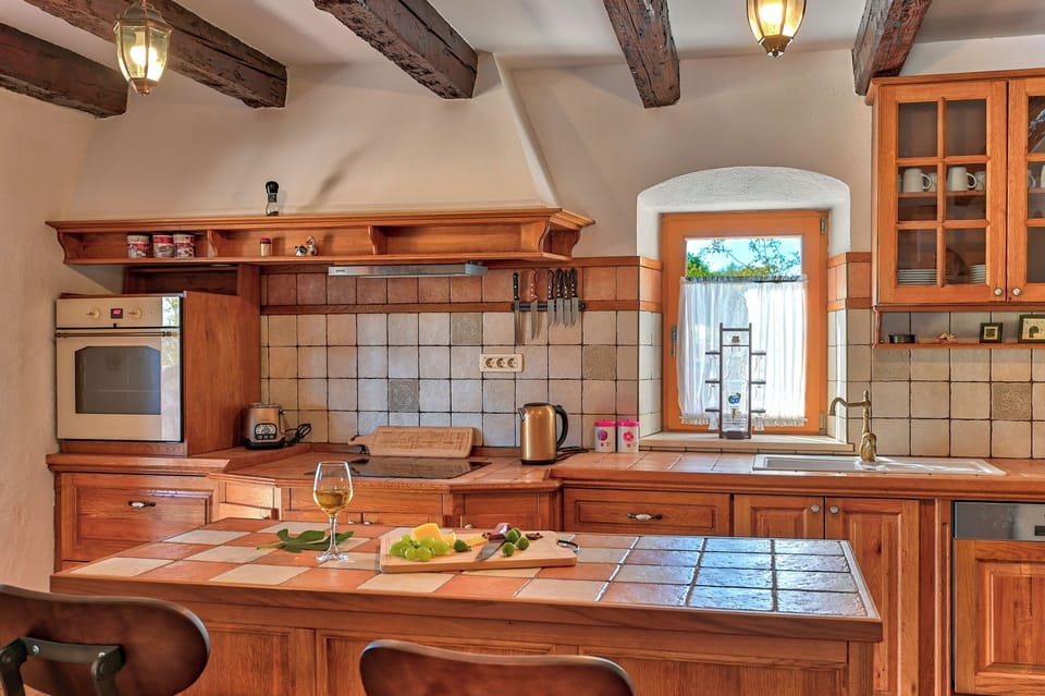 Villa | Private kitchen | Fridge, microwave, oven, stovetop