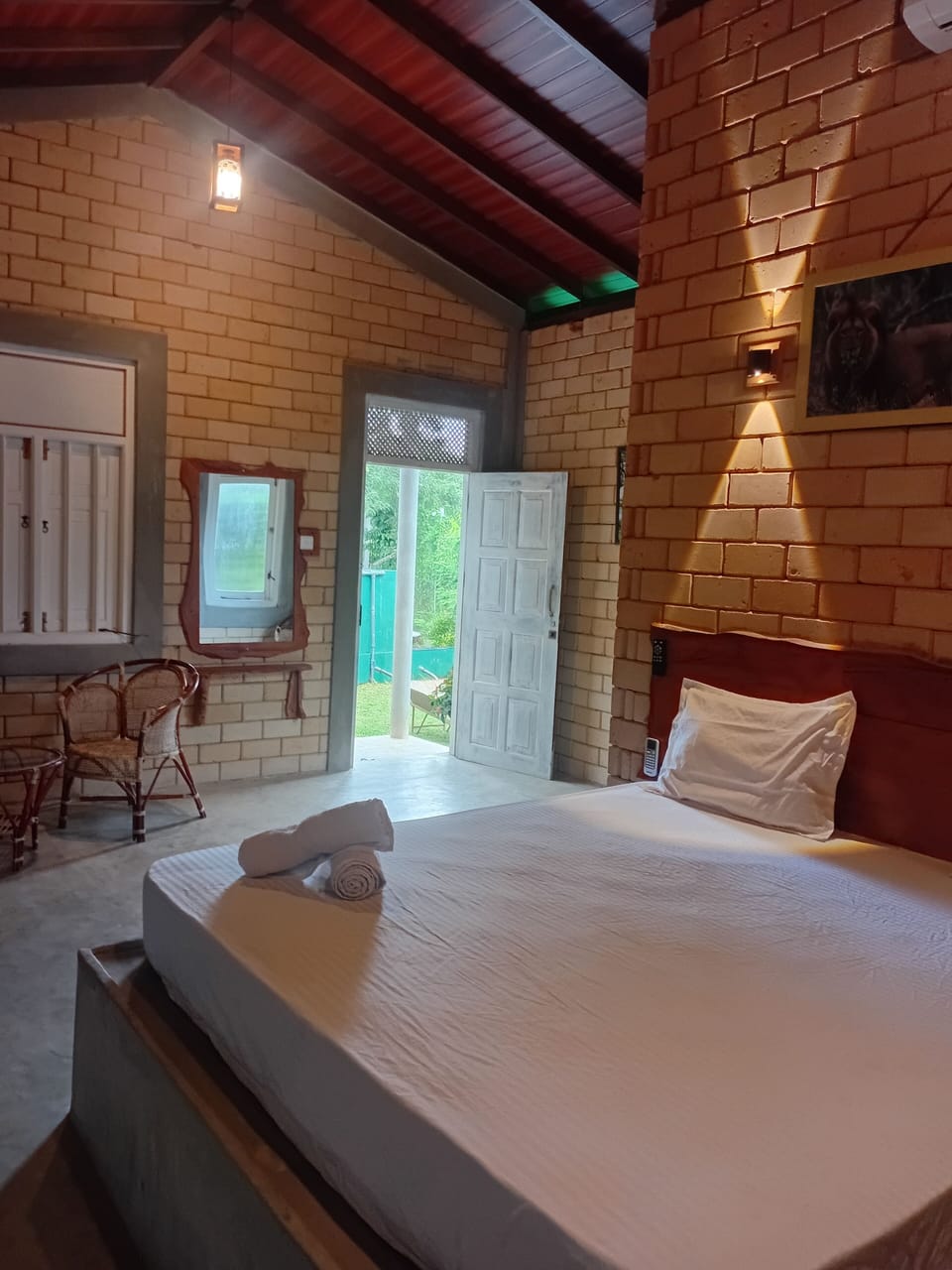 Triple Room, Garden View | Iron/ironing board, WiFi (free)