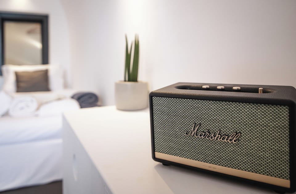 Callista Two Bedroom Villa with Caldera View & Outdoor Jetted Tub | Living area | 32-inch flat-screen TV with satellite channels