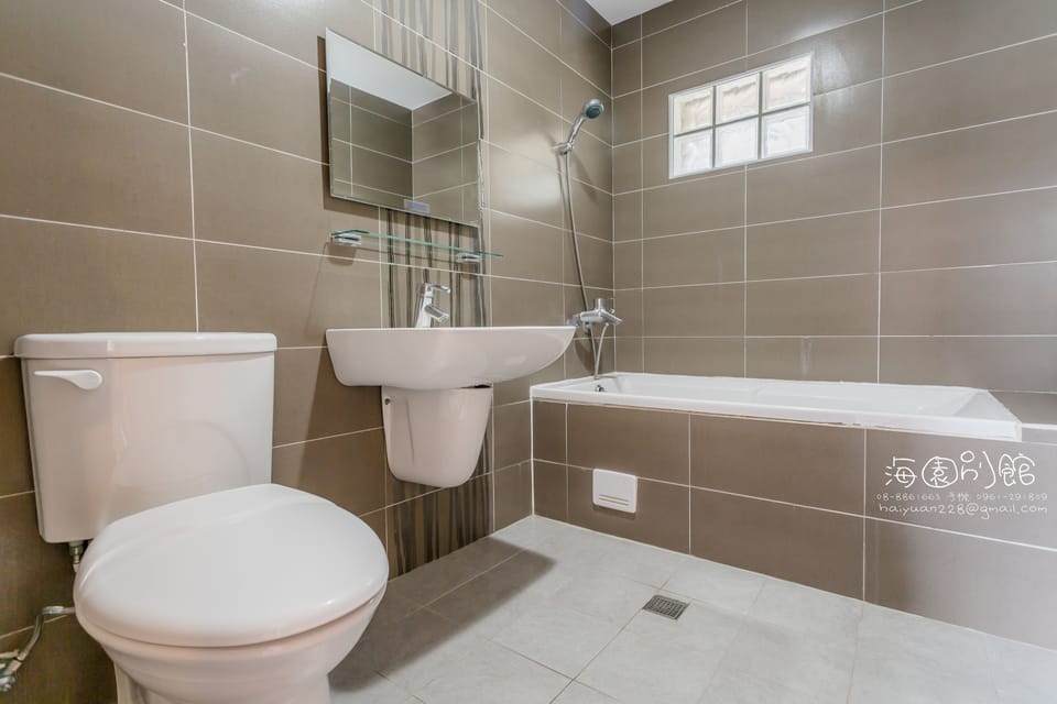 Shower, hair dryer, slippers, towels