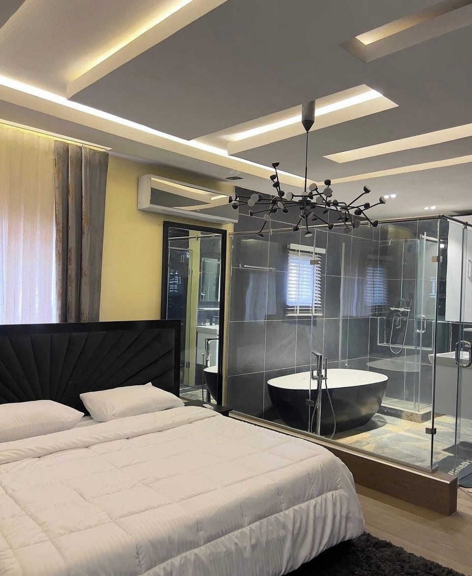 Deluxe Room, Balcony, City View | Desk, laptop workspace, blackout drapes, soundproofing