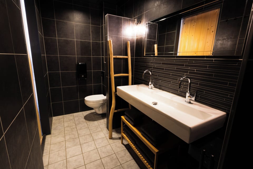 Comfort Room | Bathroom | Shower, hair dryer, towels, toilet paper