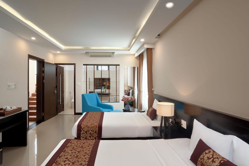 Family Triple Suite with Balcony and View | Premium bedding, minibar, desk, laptop workspace