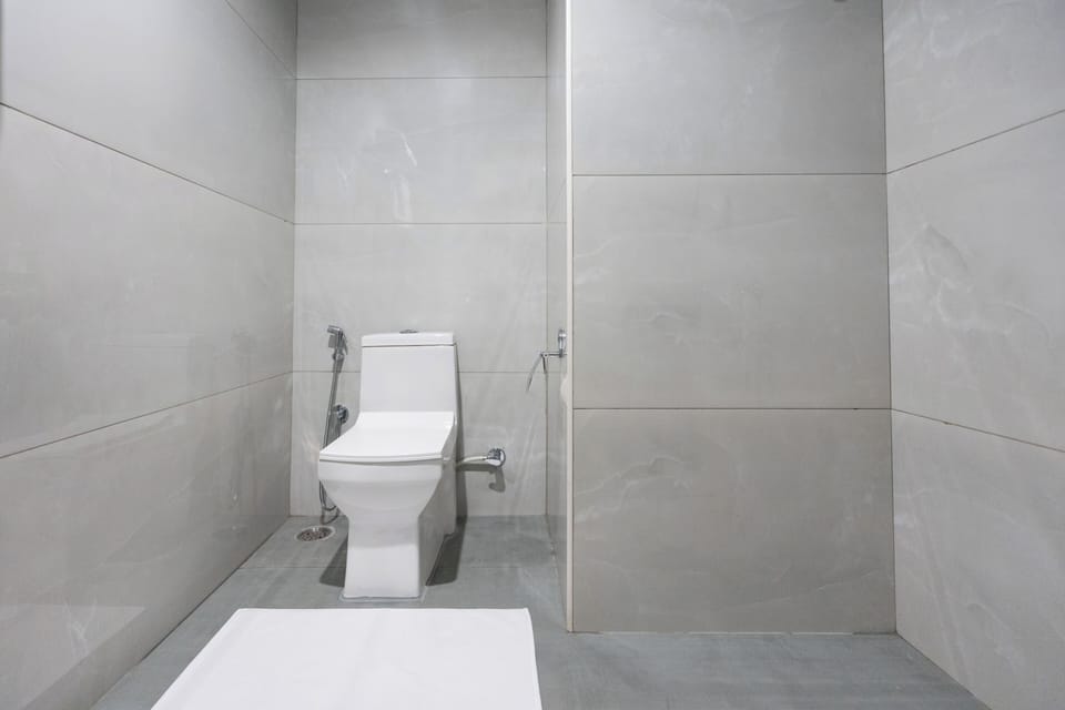 Shower, free toiletries, slippers, soap