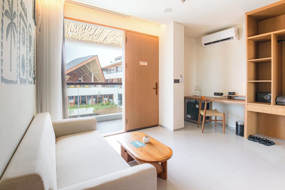 Deluxe Twin Room | Living area | 72-inch Smart TV with digital channels