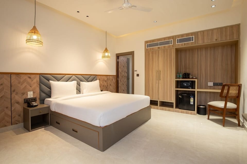 Premier Double Room, Pool View | Frette Italian sheets, premium bedding, down comforters