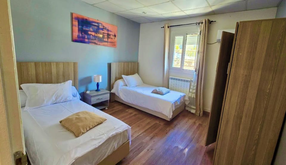 Double or Twin Room | Desk, laptop workspace, blackout drapes, WiFi (free)