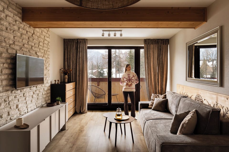 Deluxe Apartment, Balcony | Living area | Flat-screen TV