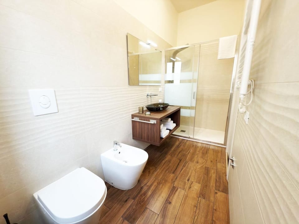 Superior Quadruple Room, Balcony, City View | Bathroom | Bathrobes, slippers, bidet