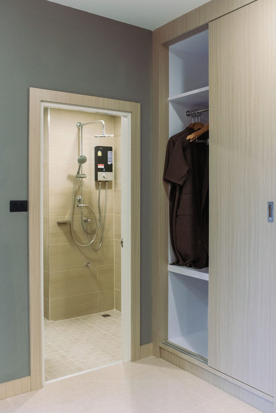 Family Triple Room, Balcony, City View | In-room safe, laptop workspace, blackout drapes