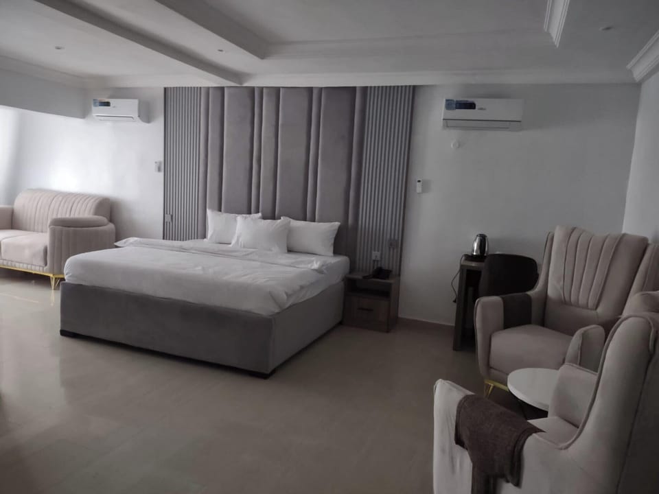 Deluxe Room, Balcony, City View | Desk, laptop workspace, blackout drapes, soundproofing