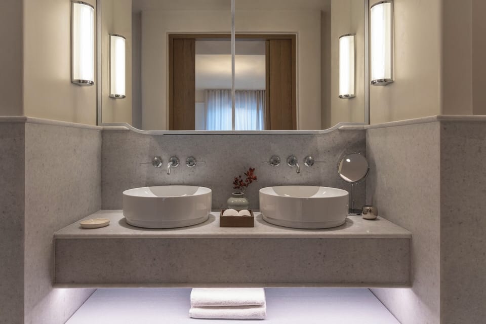 Shower, hair dryer, slippers, towels
