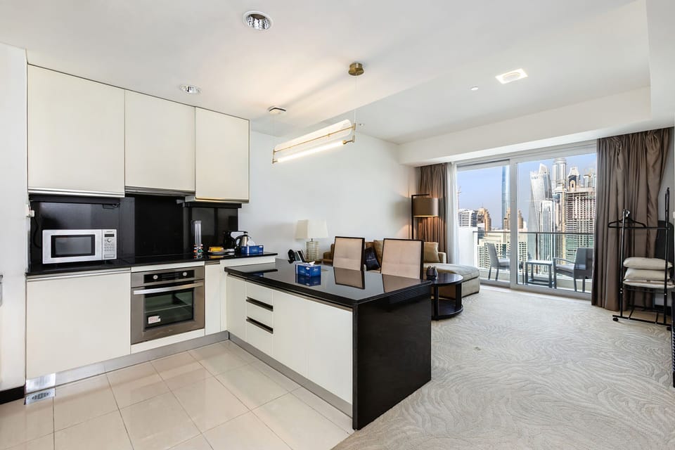 Premium Apartment, 1 Bedroom, Balcony, Canal View | Private kitchen | Espresso maker, electric kettle, toaster, cleaning supplies