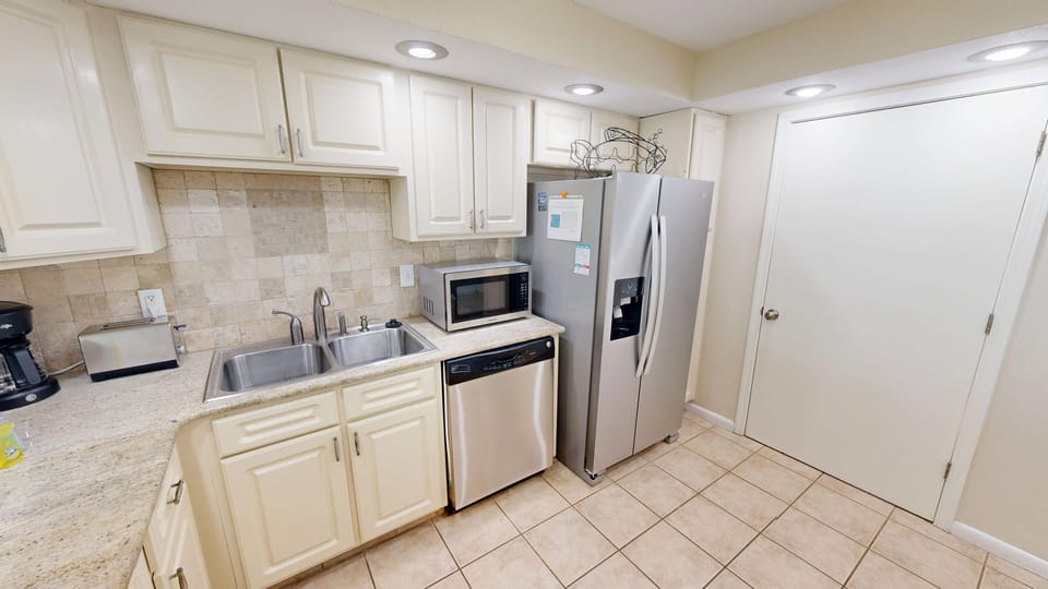 Condo, 2 Bedrooms | Private kitchen | Coffee/tea maker, fridge, oven, toaster
