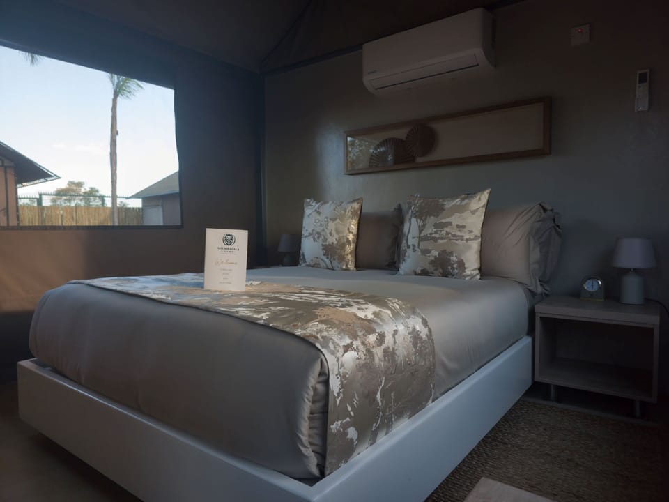 Basic Tent | Premium bedding, down comforters, iron/ironing board (on request)
